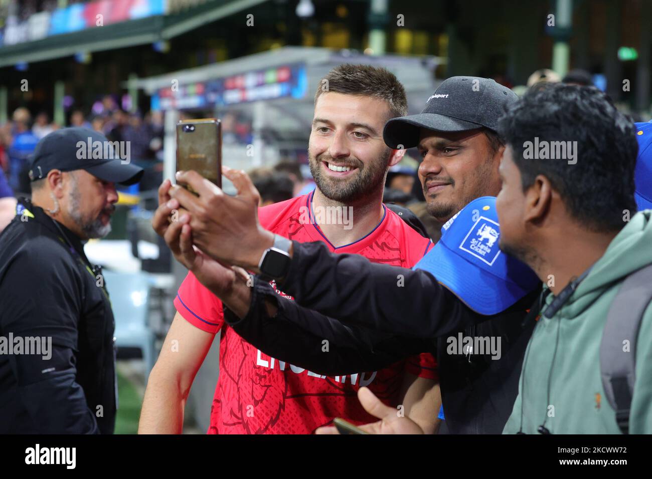 Sydney, Australia. 05th Nov, 2022. Mark Wood of England has a selfie with fans during the ICC Mens T20 World Cup 2022 match between England and Sri Lanka at Sydney Cricket Ground, Sydney, Australia on 5 November 2022. Photo by Peter Dovgan. Editorial use only, license required for commercial use. No use in betting, games or a single club/league/player publications. Credit: UK Sports Pics Ltd/Alamy Live News Stock Photo