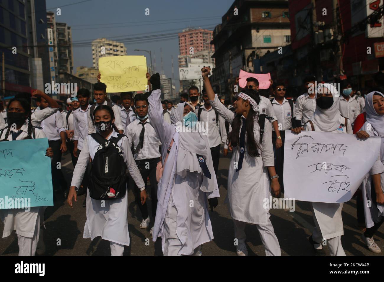 Bangladeshi students shout slogans during an ongoing protest to demand