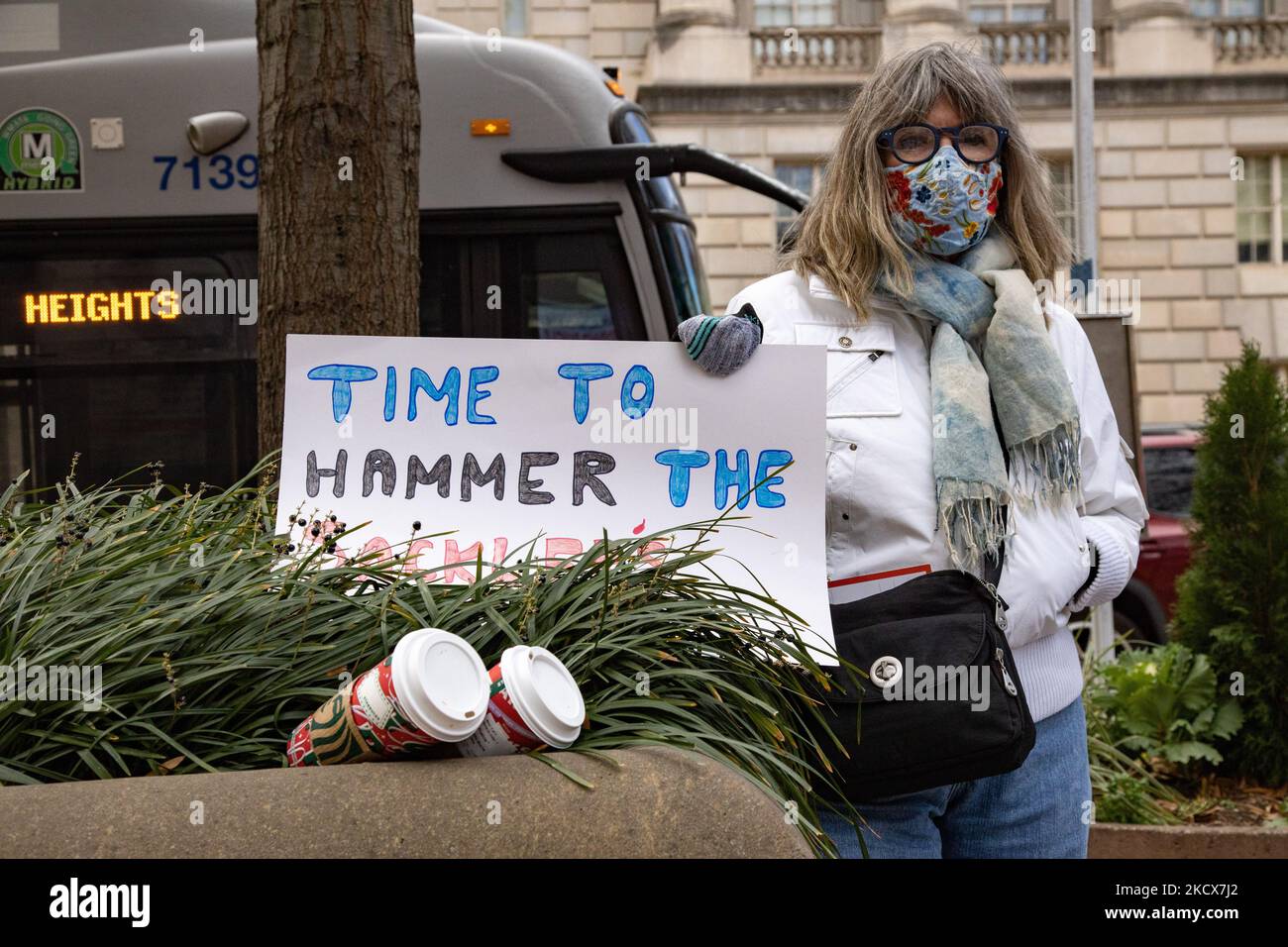 Demonstrators gather at the Department of Justice building in Washington, D.C. on December 3, 2021 to urge the government to criminally prosecute the Sackler family, the owners of Purdue Pharma, whom many say are chiefly responsible for the opioid crisis in the United States (Photo by Bryan Olin Dozier/NurPhoto) Stock Photo