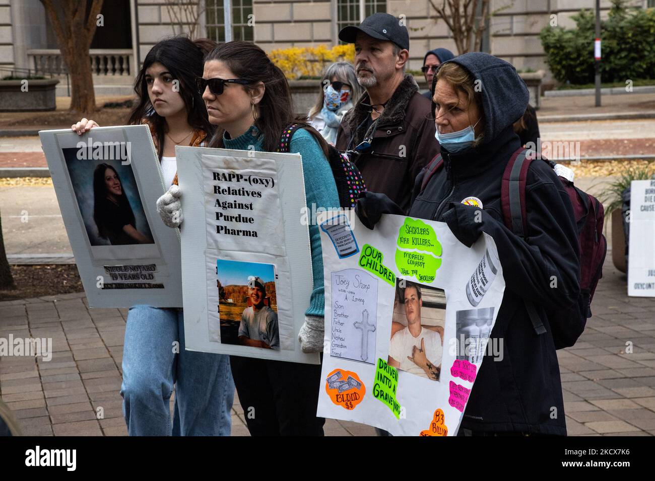 Demonstrators gather at the Department of Justice building in Washington, D.C. on December 3, 2021 to urge the government to criminally prosecute the Sackler family, the owners of Purdue Pharma, whom many say are chiefly responsible for the opioid crisis in the United States (Photo by Bryan Olin Dozier/NurPhoto) Stock Photo