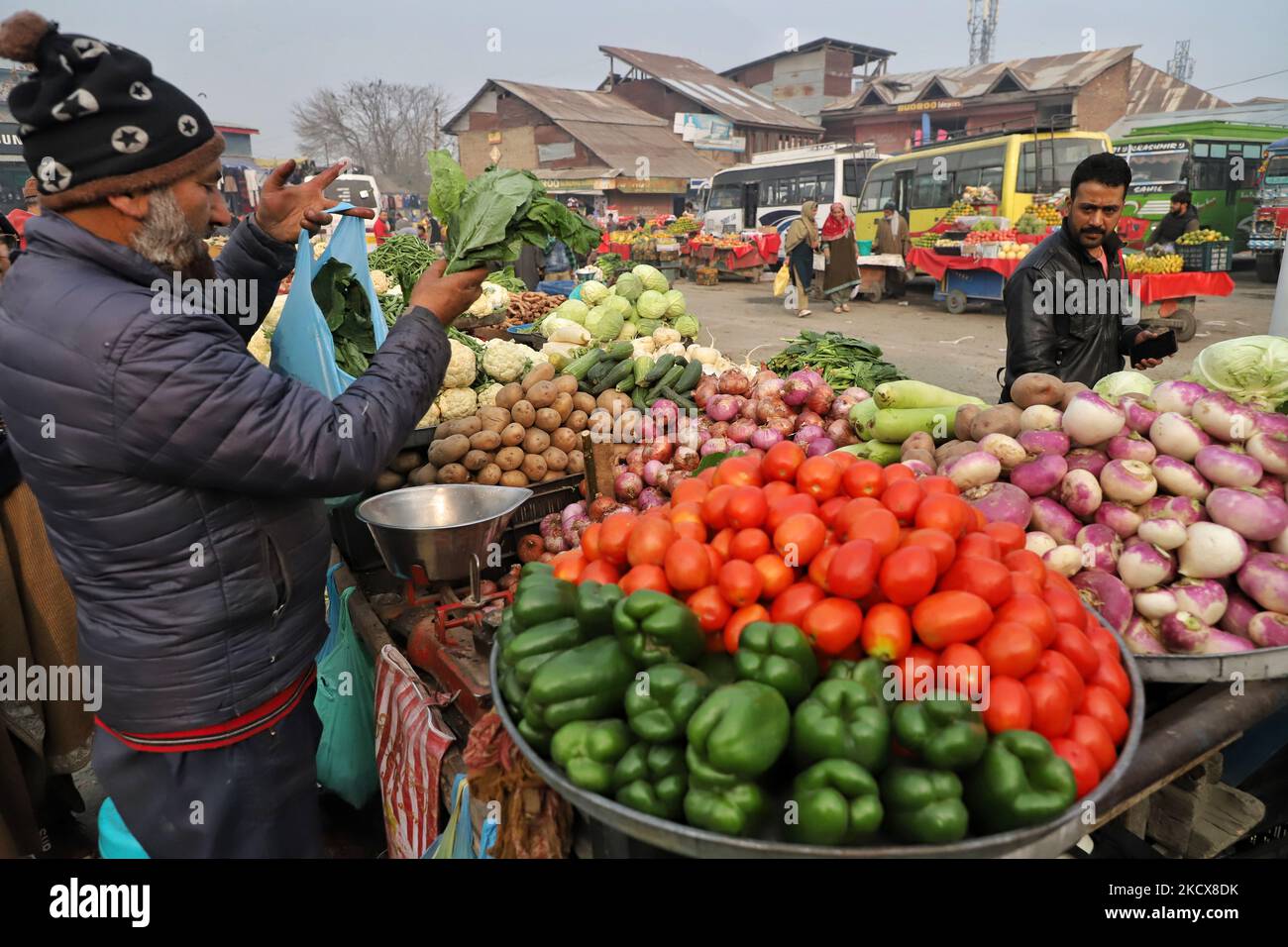Vegetable vendors selling different varieties of vegetables like