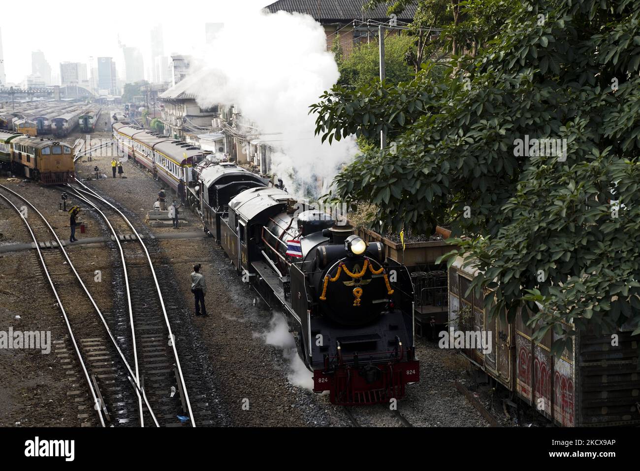 A steam leaves Bangkok Railway Station for a trip to mark