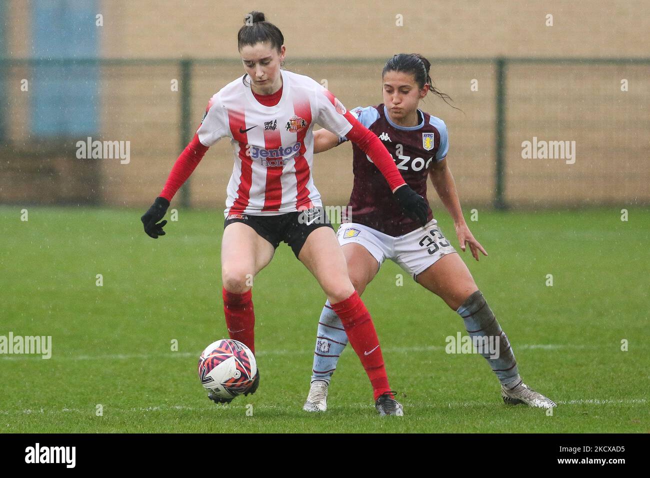 Emily Scarr of Sunderland and Mayumi Pacheco of Aston Villa in action during the the Continental Cup match between Sunderland and Aston Villa at Eppleton CW, Hetton on Sunday 5th December 2021. (Photo by Will Matthews/MI News/NurPhoto) Stock Photo