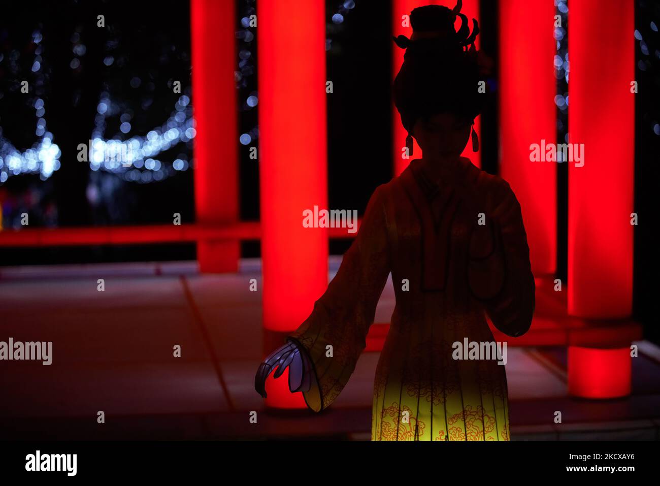 A woman made from steel and ceramics is pictured during the Lanterns festival. After being organized in Gaillac, the Lanterns festival is now organized in the city of Blagnac in the suburbs of Toulouse. In the Ritouret park on nearly 9ha, more than 2500 lanterns made of steel, ceramics and clothes built by 80 craftsperson depict in 45 scenes tales, legends and myths from China. This lantern art comes from the town of Zigong in the Sichuan province. This art dates back from the Tang dynasty. The Lanterns festival in Blagnac is the biggest lanterns show outside China. Toulouse. France. December  Stock Photo