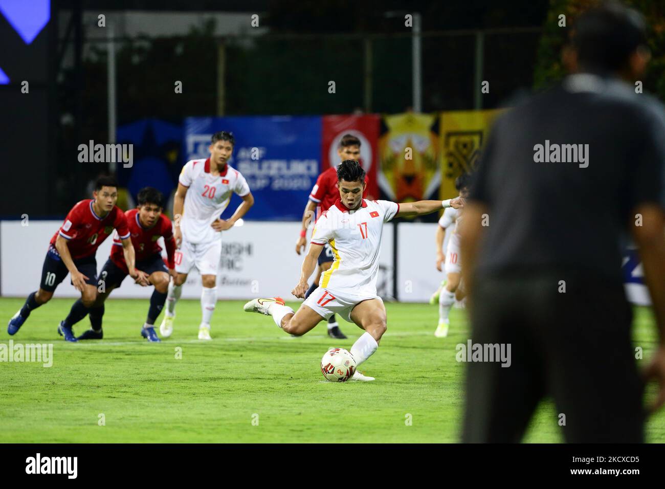 Vu Van Thanh of Vietnam takes the penalty and fails to convert during the AFF Suzuki Cup 2020 Group B match between Laos and Vietnam at Bishan Stadium on December 6, 2021 in Singapore. (Photo by Suhaimi Abdullah/NurPhoto) Stock Photo