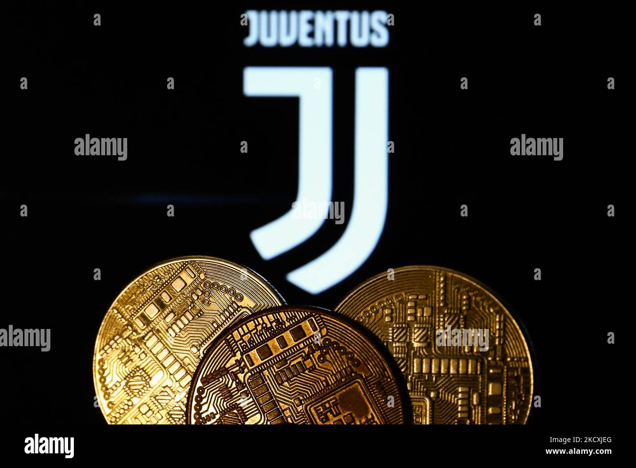 Representation of cryptocurrency is seen with Juventus football club logo  displayed in the background in this illustration photo taken in Krakow,  Poland on December 10, 2021. (Photo by Jakub Porzycki/NurPhoto Stock Photo -