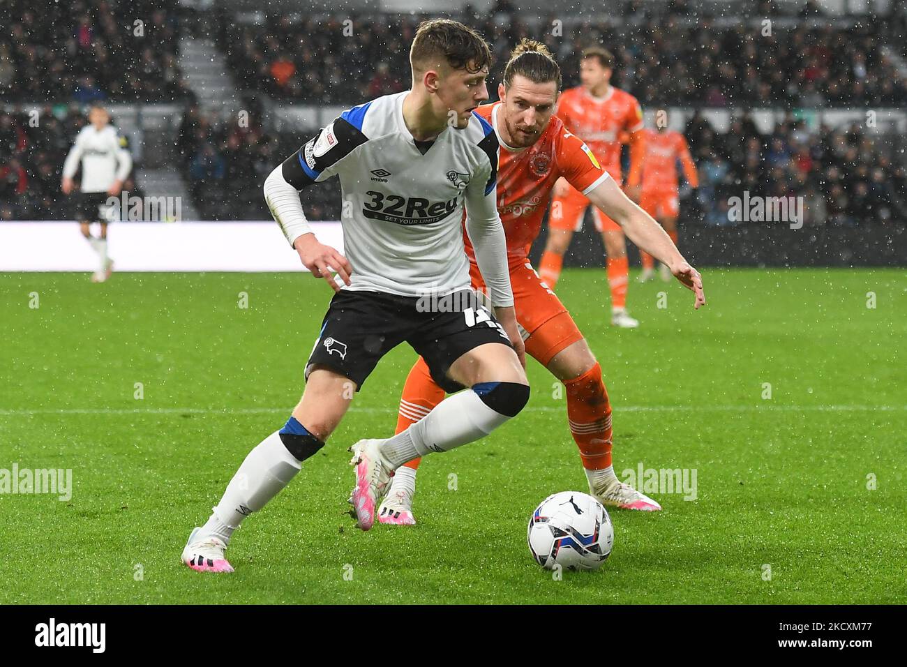 Dylan Williams of Derby County shields the ball from James Husband of ...