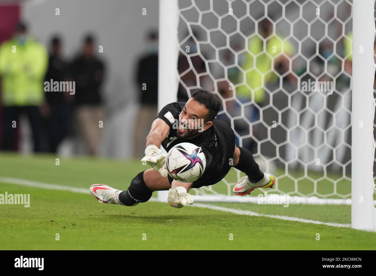 goalkeeper Abdelkader Bedrane of Algeria team scores past Anas Zniti of Morocco during the penalty shoot out during the FIFA Arab Cup Qatar 2021 Quarter-Final match between Morocco and Algeria at Al Thumana Stadium on December 11, 2021 in Doha, Qatar. (Photo by Ayman Aref/NurPhoto) Stock Photo