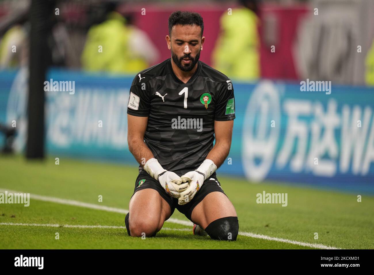 goalkeeper Anas Zniti of Morocco team prays during the FIFA Arab Cup Qatar 2021 Quarter-Final match between Morocco and Algeria at Al Thumana Stadium on December 11, 2021 in Doha, Qatar. (Photo by Ayman Aref/NurPhoto) Stock Photo