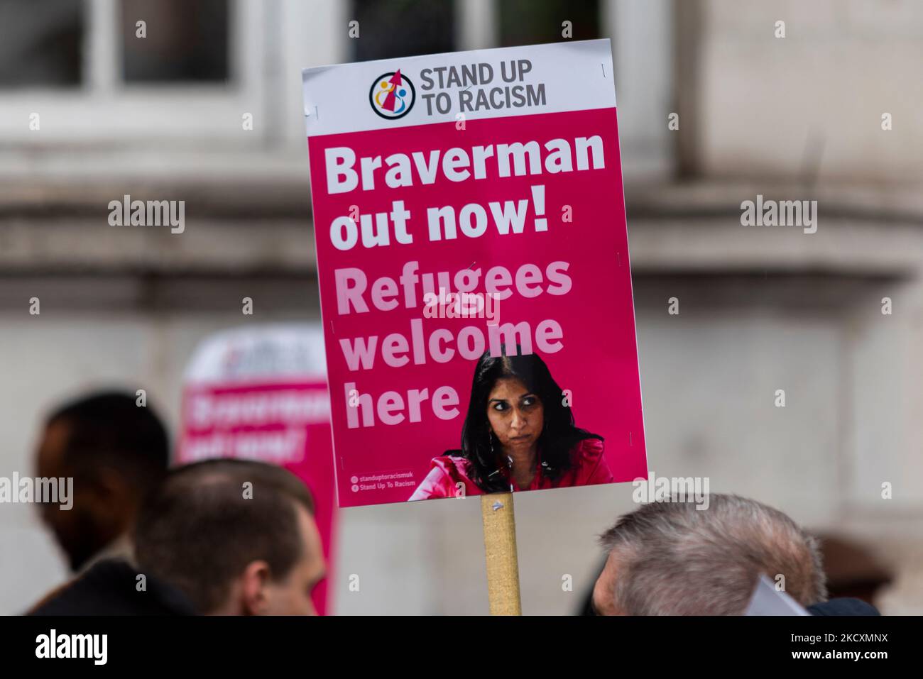 Westminster, London, UK. 5th Nov, 2022. Protesters are demonstrating in London asking for a general election to take place in the UK following the repeated change of Conservative party leadership and therefore Prime Ministers. They regard the Prime Minister as being unelected. Other themes include the cost of living crisis, immigration, low wages, fuel poverty and nationalisation. Suella Braverman placard. Refugees welcome here Stock Photo