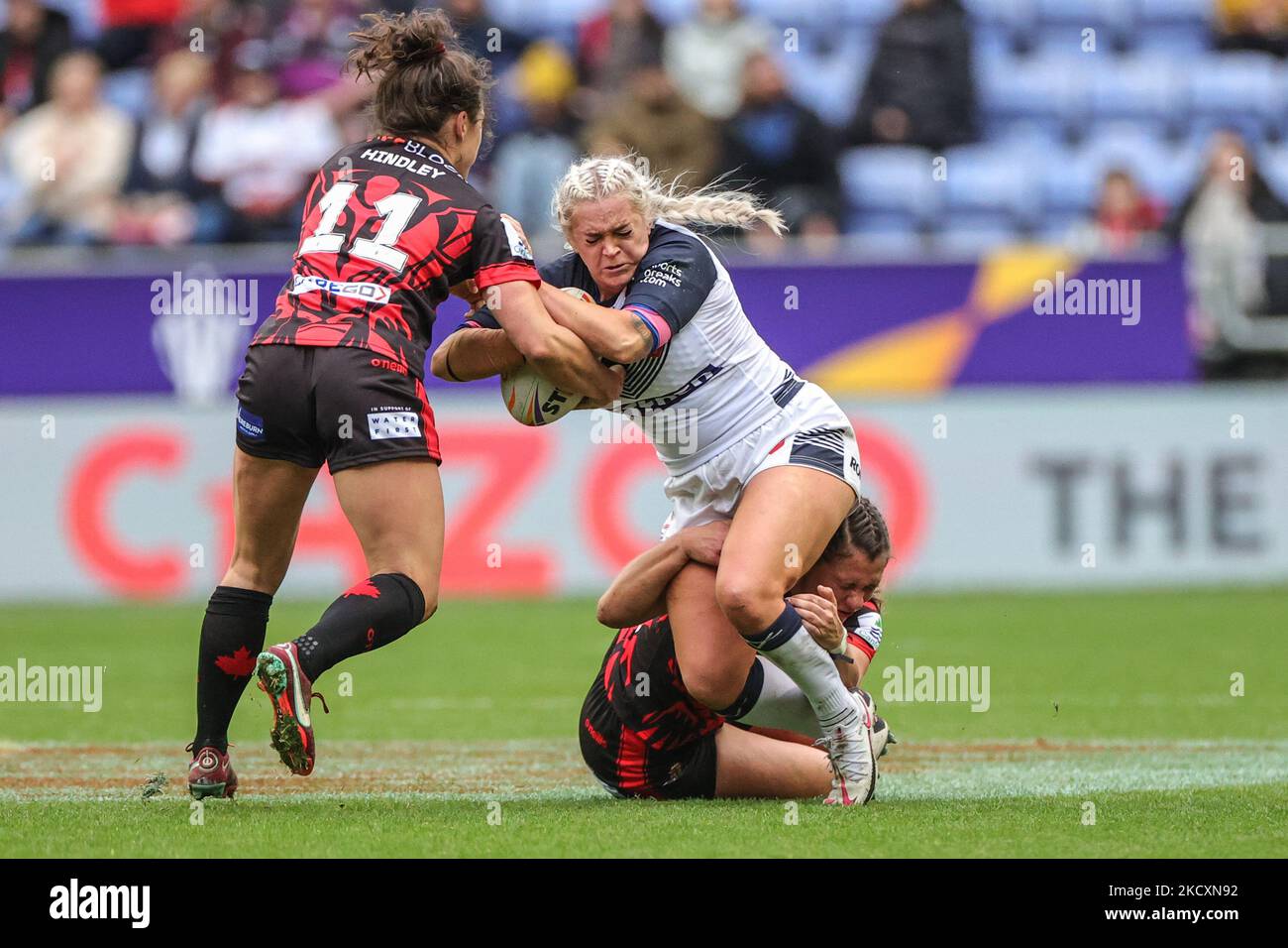 Hindley Rugby Shona Hoyle England is tackled by Gabrielle Hindley of Canada during ...