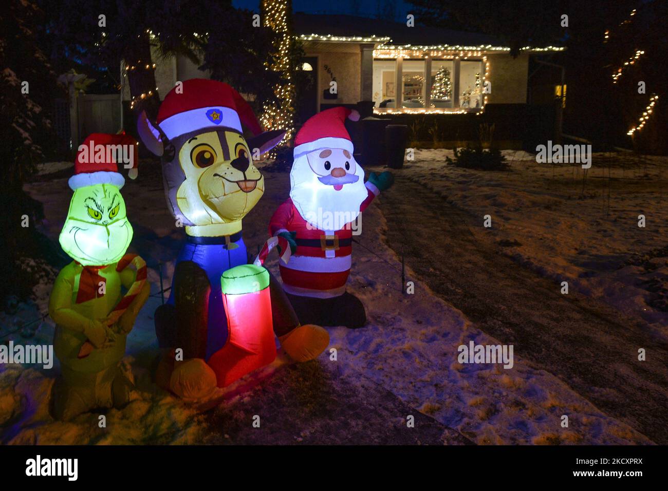 Christmas decorations in front of the house in Candy Cane Lane, a