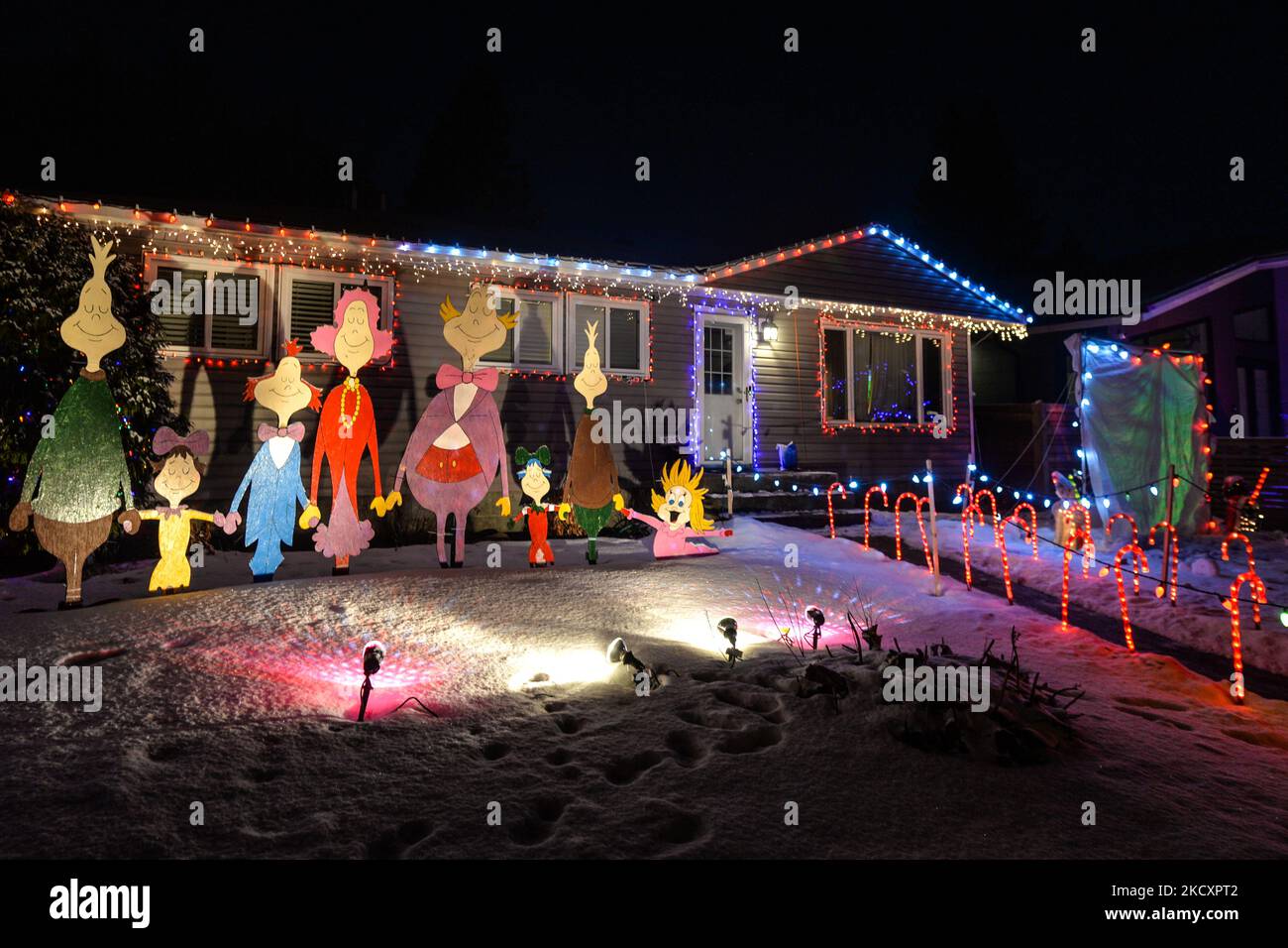 Christmas decorations in front of the house in Candy Cane Lane, a