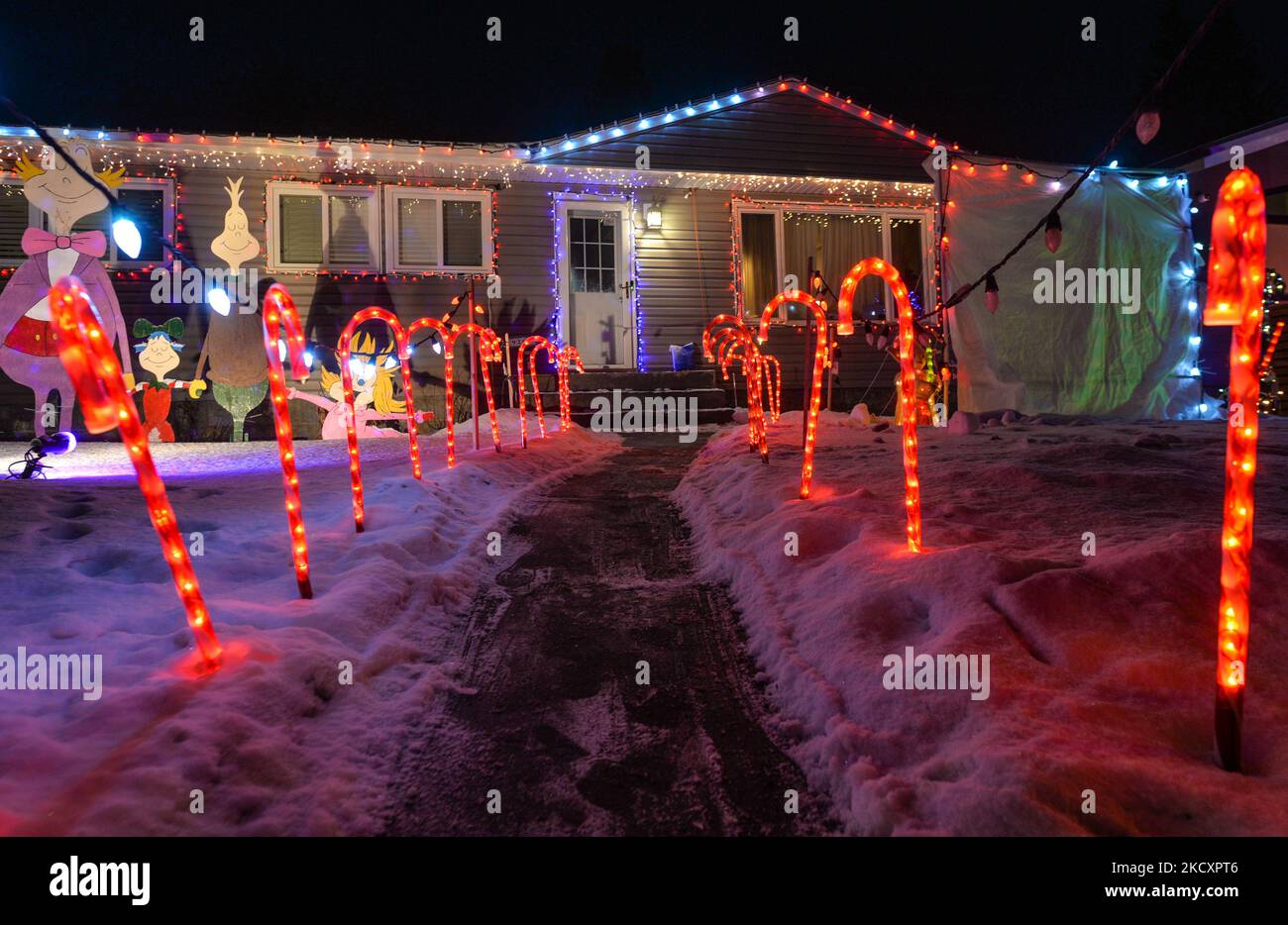 Christmas decorations in front of the house in Candy Cane Lane, a Christmas decorations in front of the house in Candy Cane Lane, a