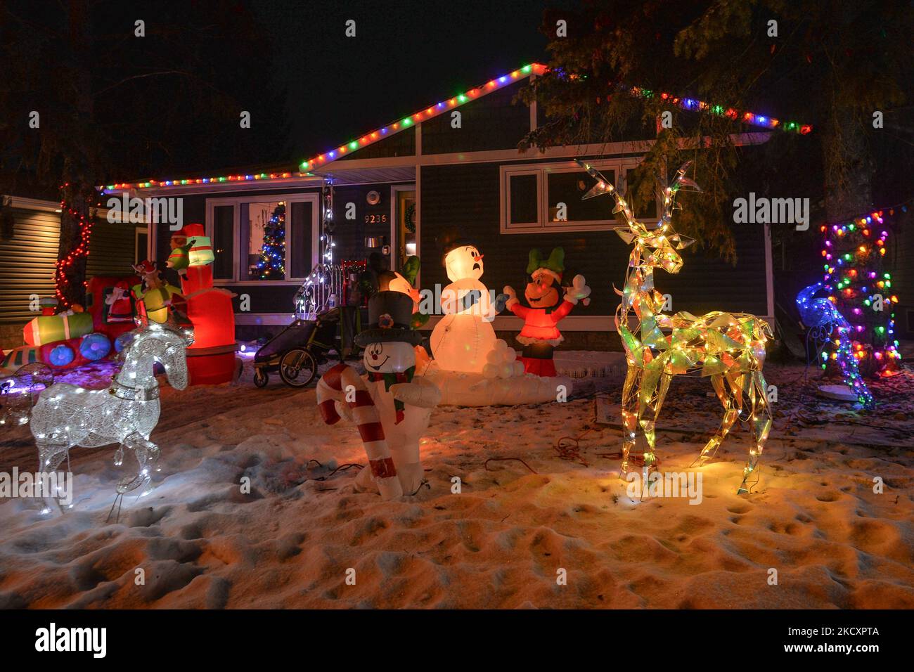 Christmas decorations in front of the house in Candy Cane Lane, a Christmas decorations in front of the house in Candy Cane Lane, a