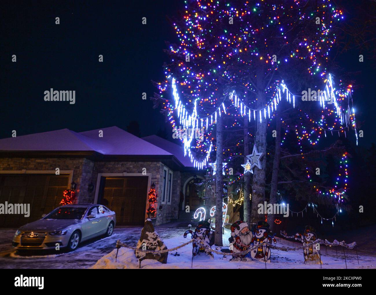 Christmas decorations in front of the house in Candy Cane Lane, a