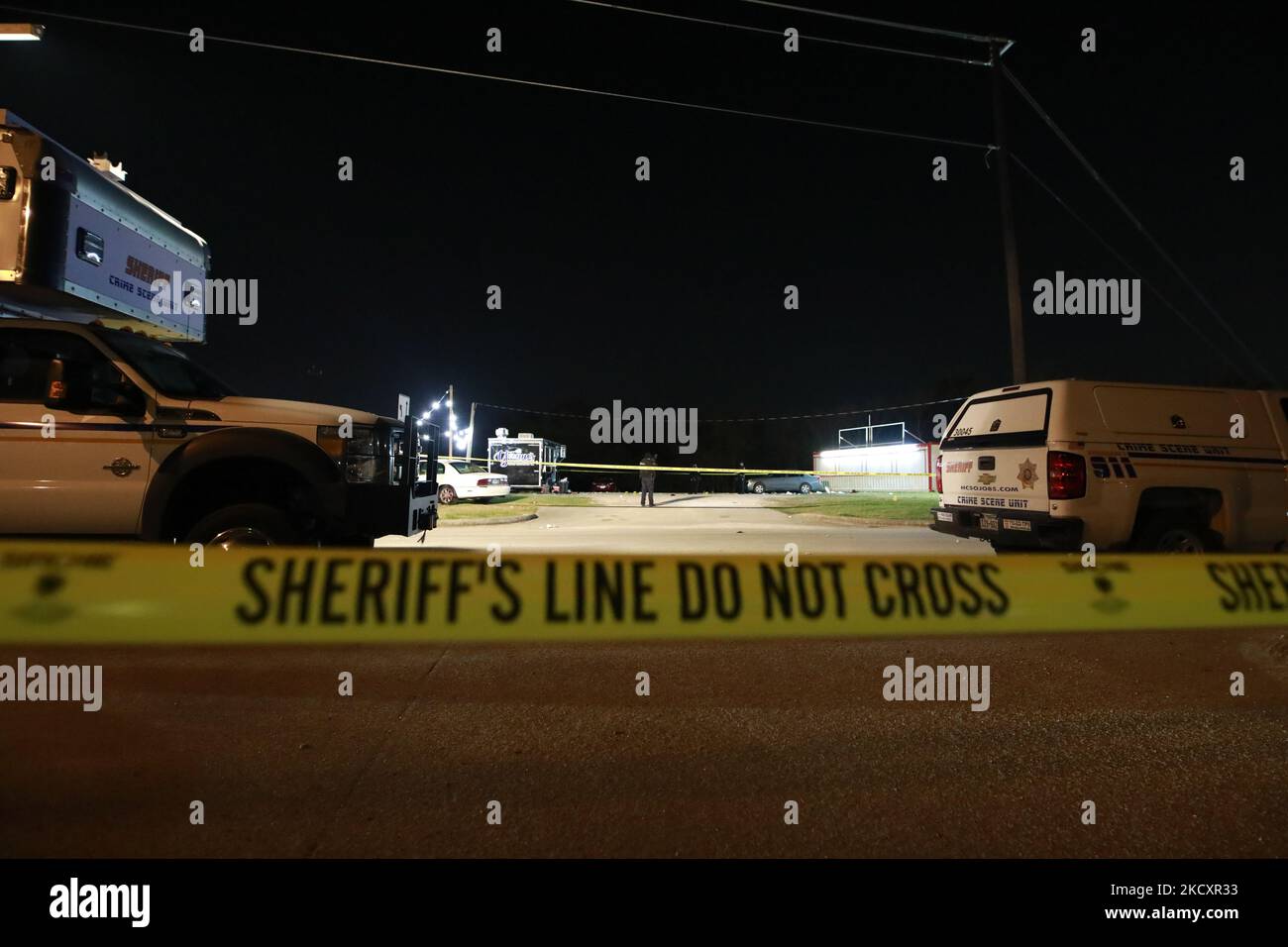 Police block off the roads at the crime scene of a mass shooting in