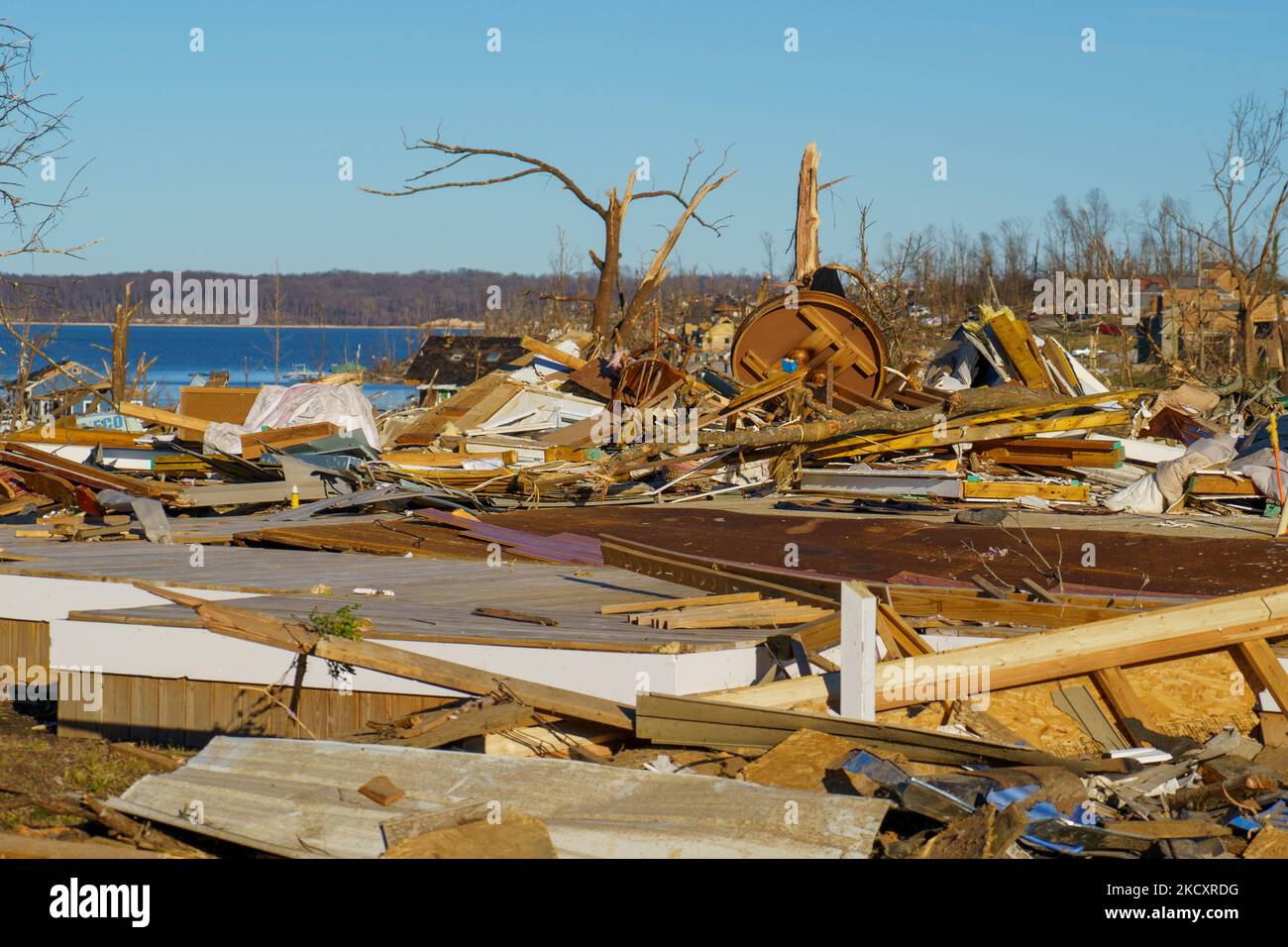 Heavy damage is seen after a tornado swept through multiple states on