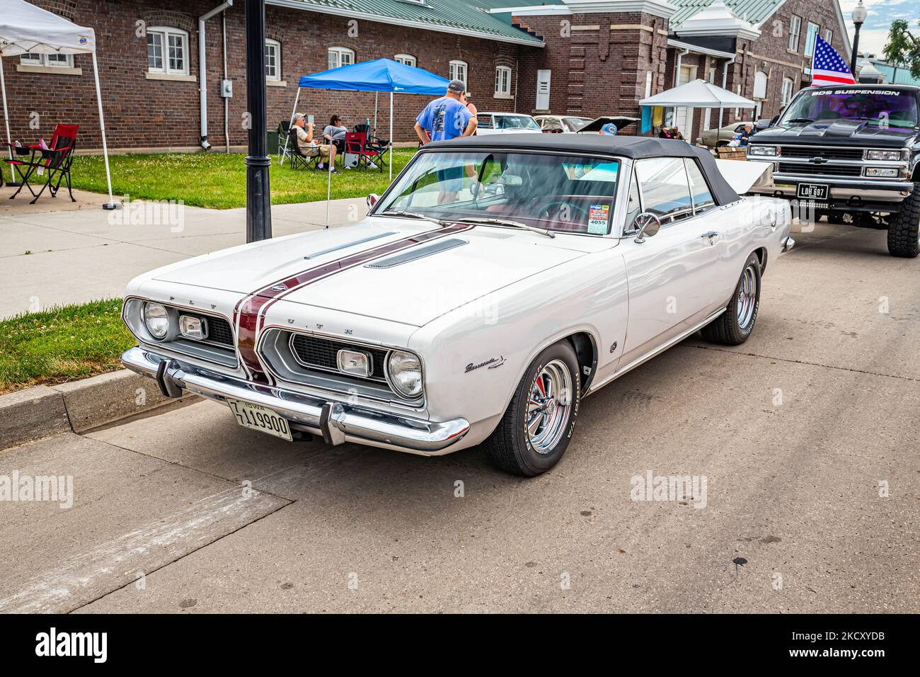 Des Moines, IA - July 01, 2022: High perspective front corner view of a 1967 Plymouth Barracuda Formula S Convertible at a local car show. Stock Photo