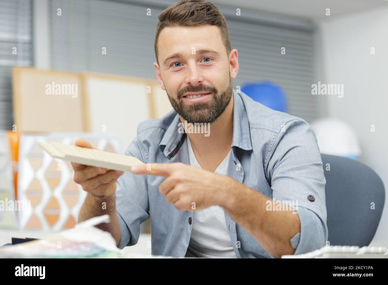 designer working with wood samples Stock Photo - Alamy