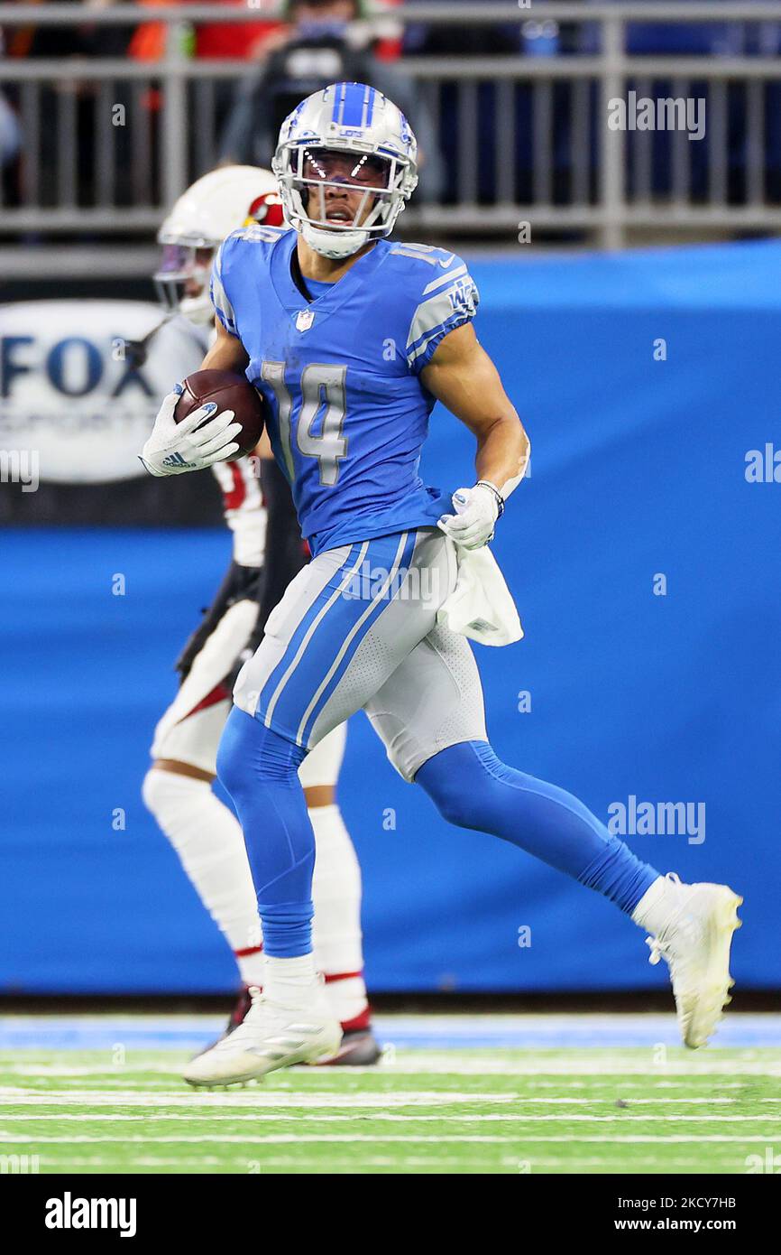 Detroit Lions wide receiver Amon-Ra St. Brown (14) carries the ball during an NFL football game between the Detroit Lions and the Arizona Cardinals in Detroit, Michigan USA, on Sunday, December 19, 2021. (Photo by Amy Lemus/NurPhoto) Stock Photo