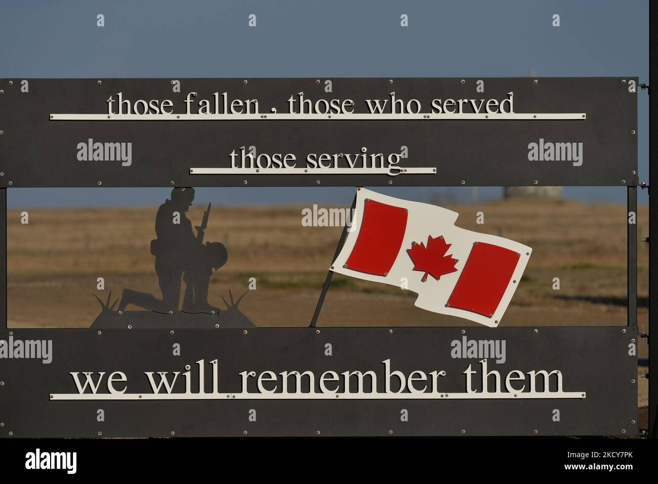 A board 'We Will Remember Them' at the entrance to the rest area along the Veteran Memorial Highway near Hanna. On Thursday, 7 October 2021, in Hanna, Alberta, Canada. (Photo by Artur Widak/NurPhoto) Stock Photo