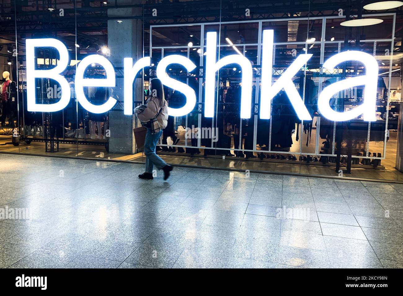 A woman passes by Bershka store in the shopping mall in Krakow, Poland on  December 20, 2021 (Photo by Jakub Porzycki/NurPhoto Stock Photo - Alamy
