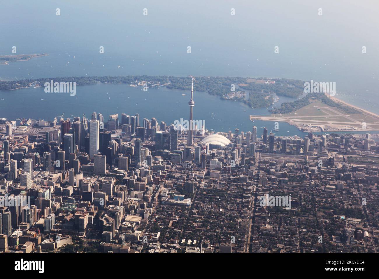 Aerial view of the city of Toronto in Ontario, Ontario, Canada, on August 26, 2012. Shown here along with the downtown skyscrapers are the notable landmarks of the CN Tower and Skydome Stadium. (Photo by Creative Touch Imaging Ltd./NurPhoto) Stock Photo