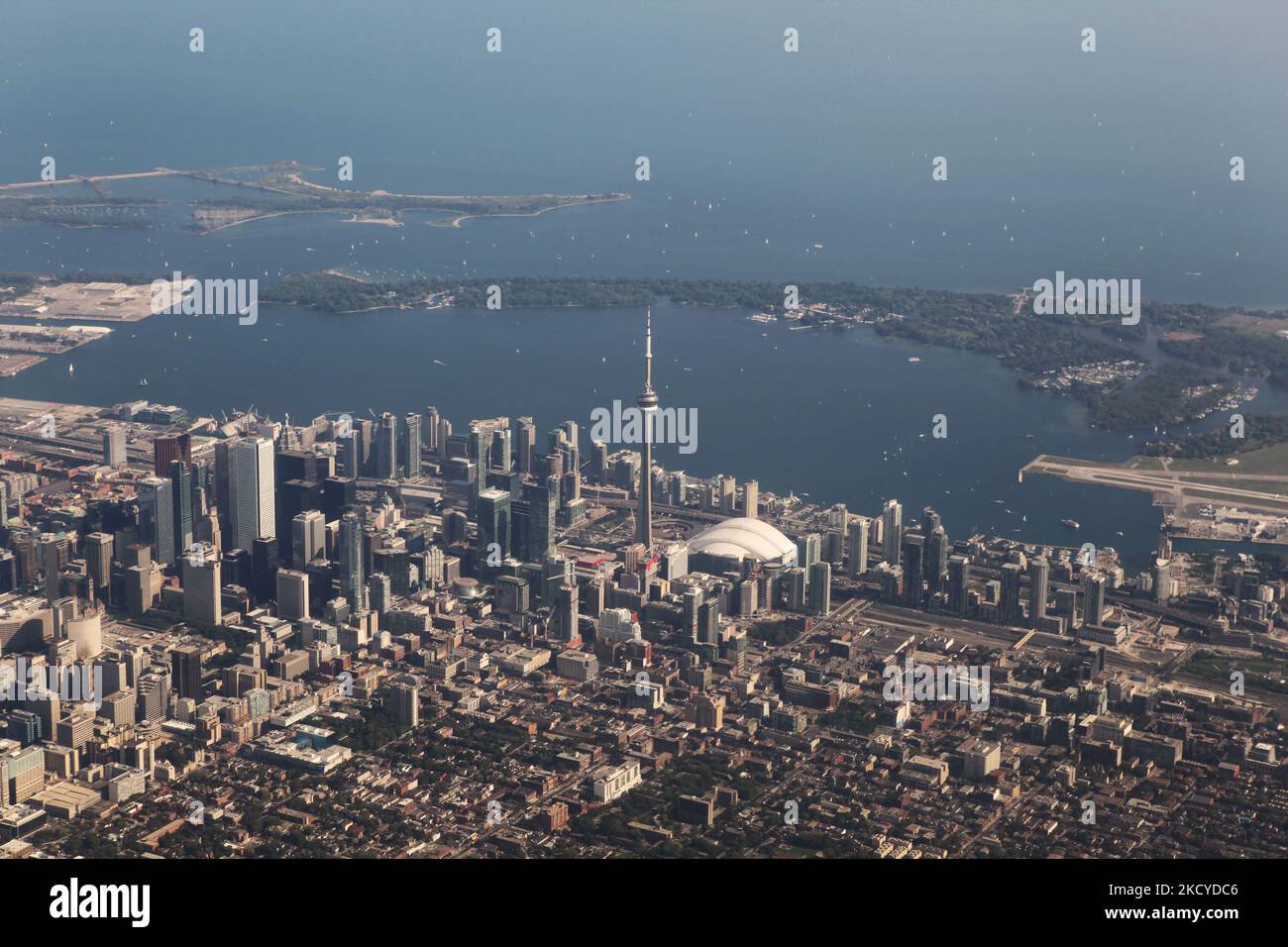 Aerial view of the city of Toronto in Ontario, Ontario, Canada, on August 26, 2012. Shown here along with the downtown skyscrapers are the notable landmarks of the CN Tower and Skydome Stadium. (Photo by Creative Touch Imaging Ltd./NurPhoto) Stock Photo