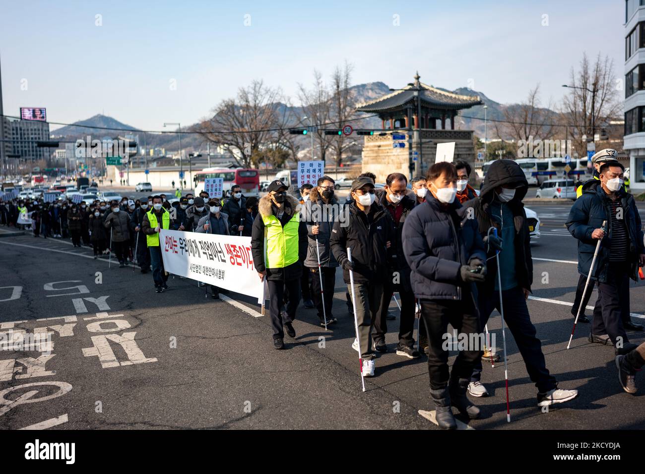 The Korean Masseur Association held a general rally ahead of the Constitutional Court's constitutional appeal on December 23, 2021 in Seoul, South Korea. They argue that the constitutional amendment is the only way to live a blind masseurs. Articles 82 and 87 of the current Medical Law stipulate that only the visually impaired can acquire a massage qualification and engage in massage business. (Photo by Chris Jung/NurPhoto) Stock Photo