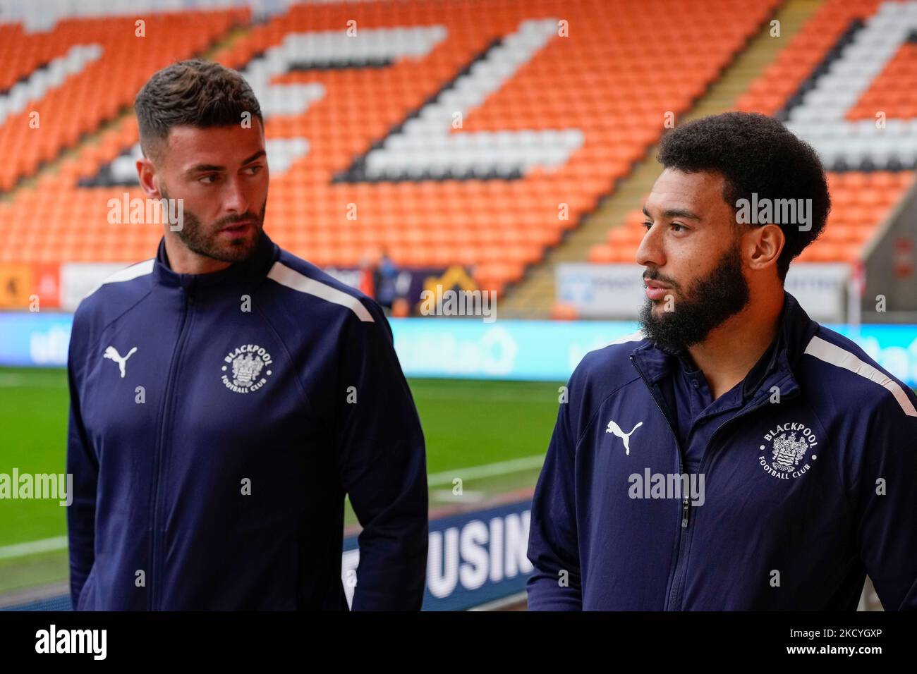 Keshi Anderson 10 of Blackpool arrives with Gary Madine at the stadium