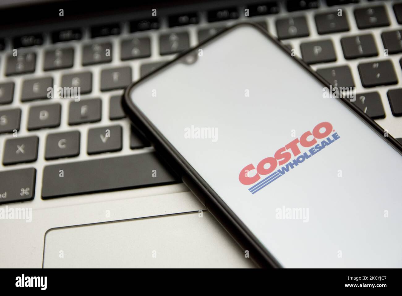 In this photo illustration a Costco logo seen displayed on a smartphone  screen with a computer keyword in the background in Athens, Greece on  December 30, 2021. (Photo by Nikolas Kokovlis/NurPhoto Stock