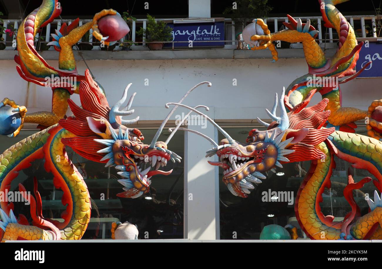 Oriental dragons above a shop in Gangtok, Sikkim, India. (Photo by