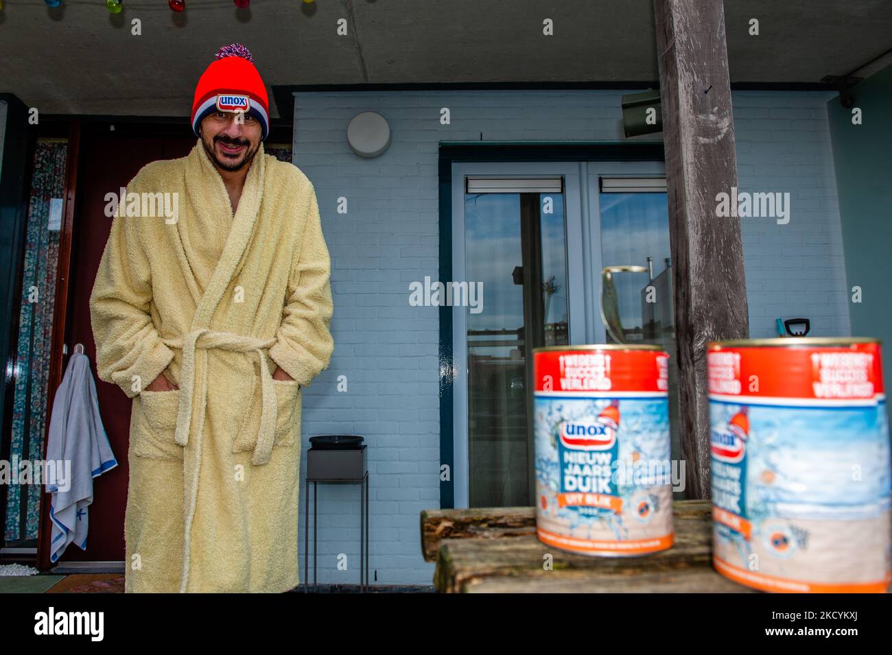 A man is ready to celebrate the traditional New Year's dive again at home because of the pandemic. In Nijmegen, on January 1st, 2021. (Photo by Romy Arroyo Fernandez/NurPhoto) Stock Photo