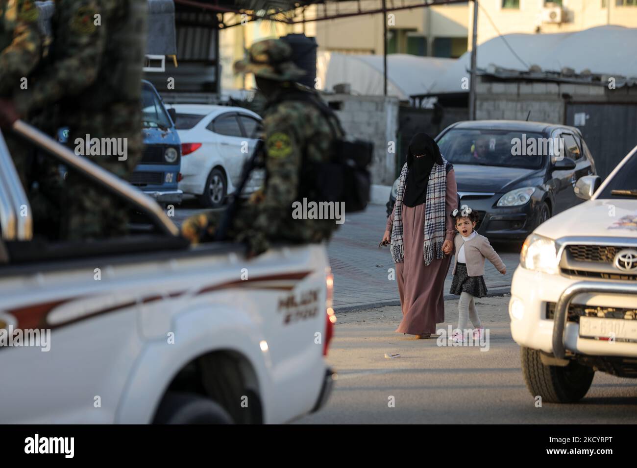 Palestinian members of the Al-Quds Brigades, the military wing of the Islamic Jihad group, march with their rifles along the main road of Gaza Strip, take part in a military parade to celebrate after â€‹a Palestinian prisoner Hisham Abu Hawash who ended his hunger strike after Israel committed to his eventual release, on January 5, 2022. (Photo by Majdi Fathi/NurPhoto) Stock Photo