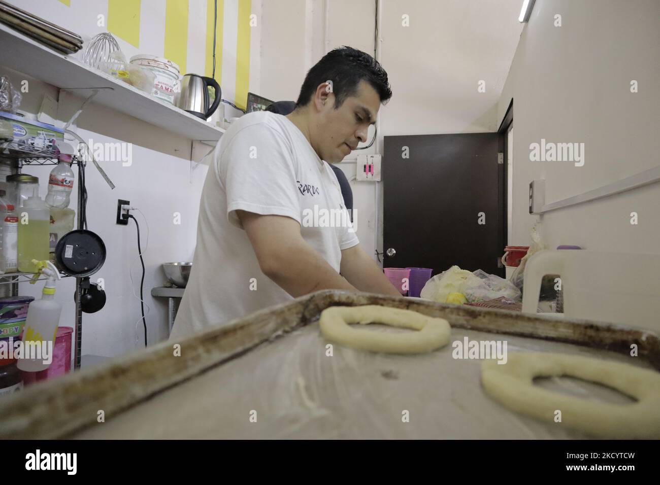 A baker makes Roscas de Reyes in a bakery in Xochimilco, Mexico City