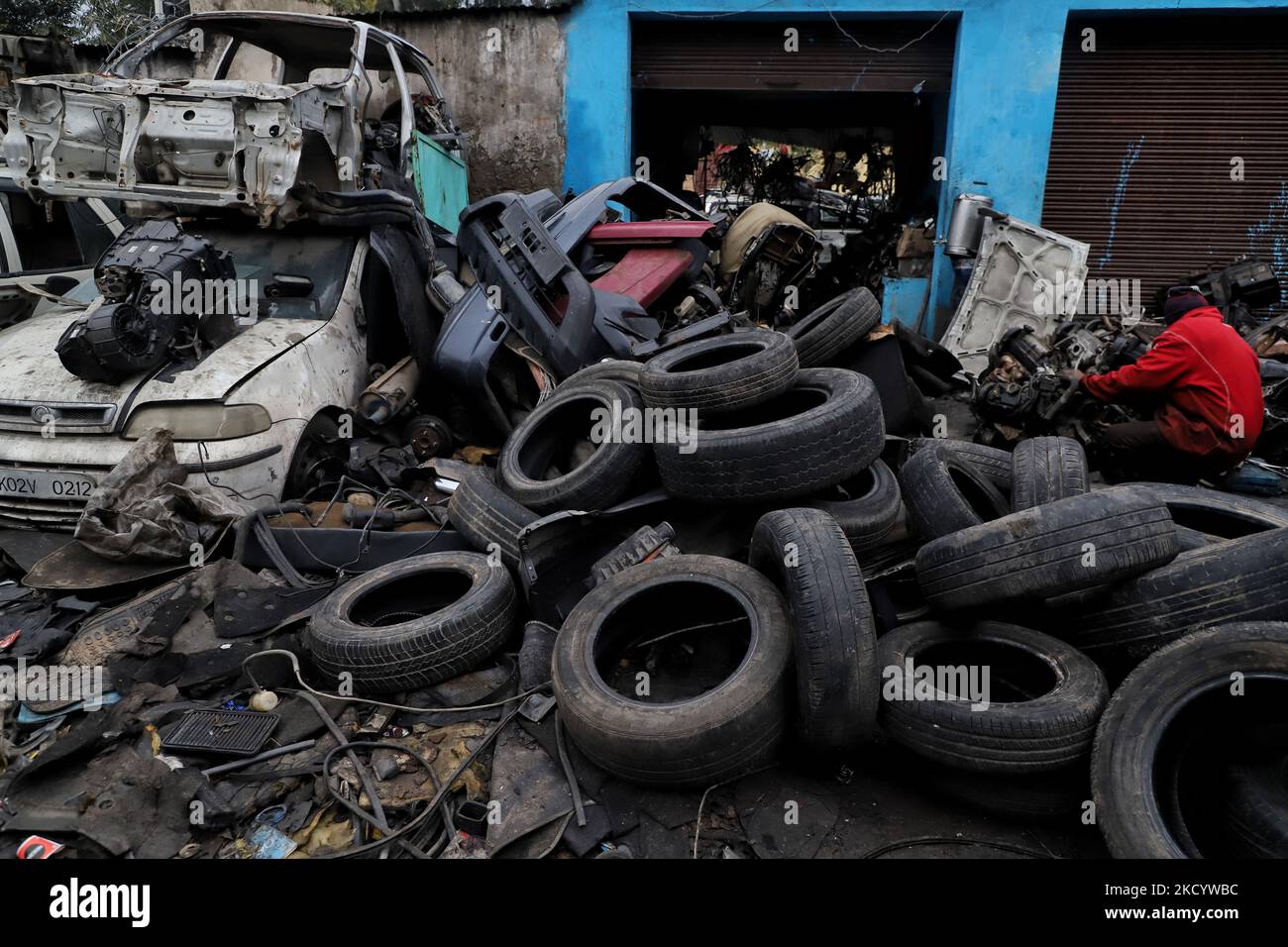 Piles of old car Tyres in a Vehicle scrap yard in Jammu City, Jammu and