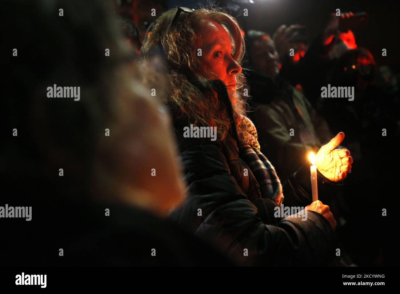 People hold a vigil sponsored by “Look Ahead America” outside of the DC