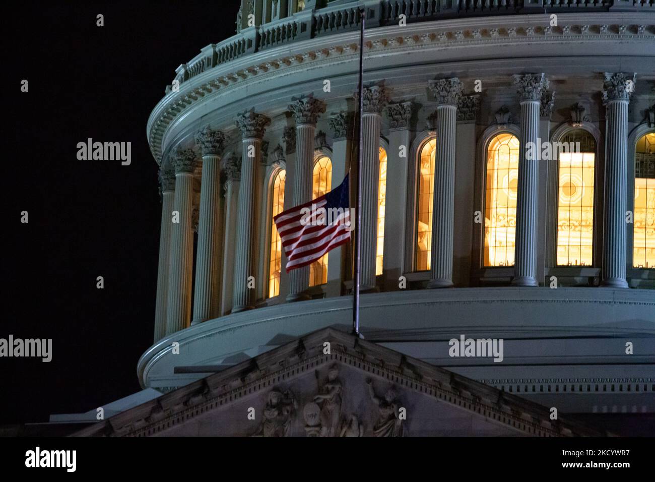 Western Inserection Flag A U.S. flag at the Capitol building flies at half staff on January 6 ...