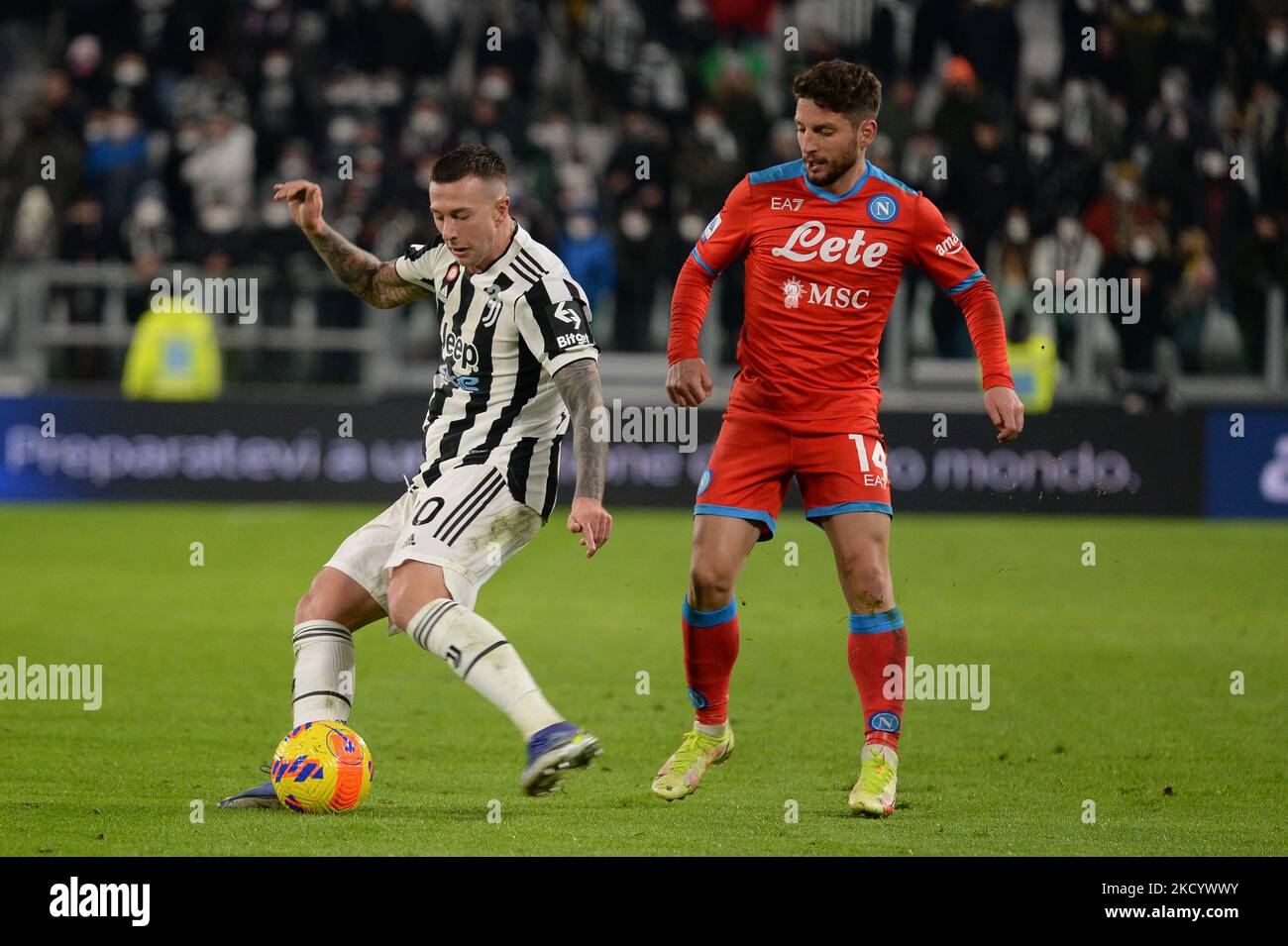 Federico Bernardeschi of Juventus FC and Dres Mertens of SSC Napoli contends the ball during the Serie A Football match between Juventus FC and SSC Napoli, at Allianz Stadium, on 6 January 2022 in Turin, Italy (Photo by Alberto Gandolfo/NurPhoto) Stock Photo