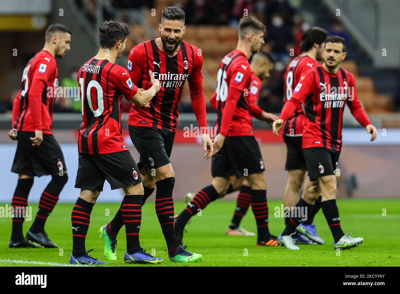 Olivier Giroud of AC Milan celebrates with his team mates after scoring a goal during the Serie A 2021/22 football match between AC Milan and AS Roma at Giuseppe Meazza Stadium, Milan, Italy on January 06, 2022 (Photo by Fabrizio Carabelli/LiveMedia/NurPhoto) Stock Photo