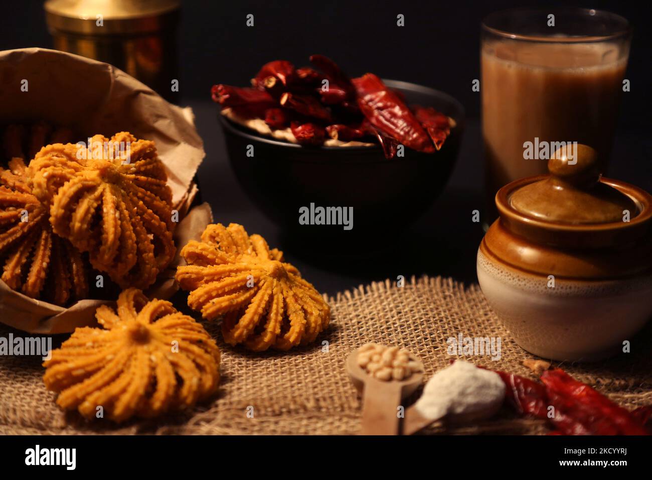 Sri Lankan style Murukku displayed with rice flour, urad dal and red