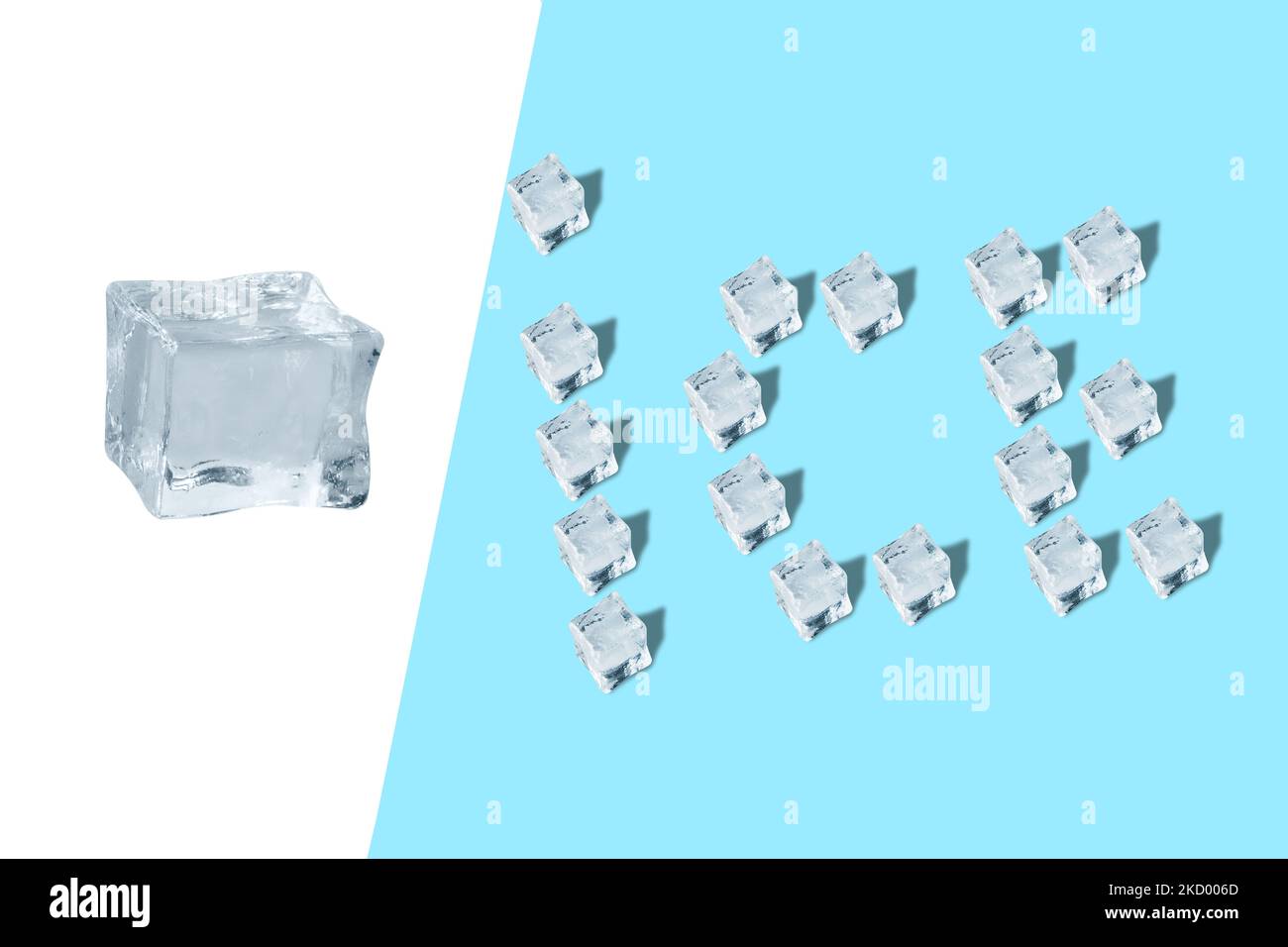 Creative layout made of ice cube over blue light background Stock Photo