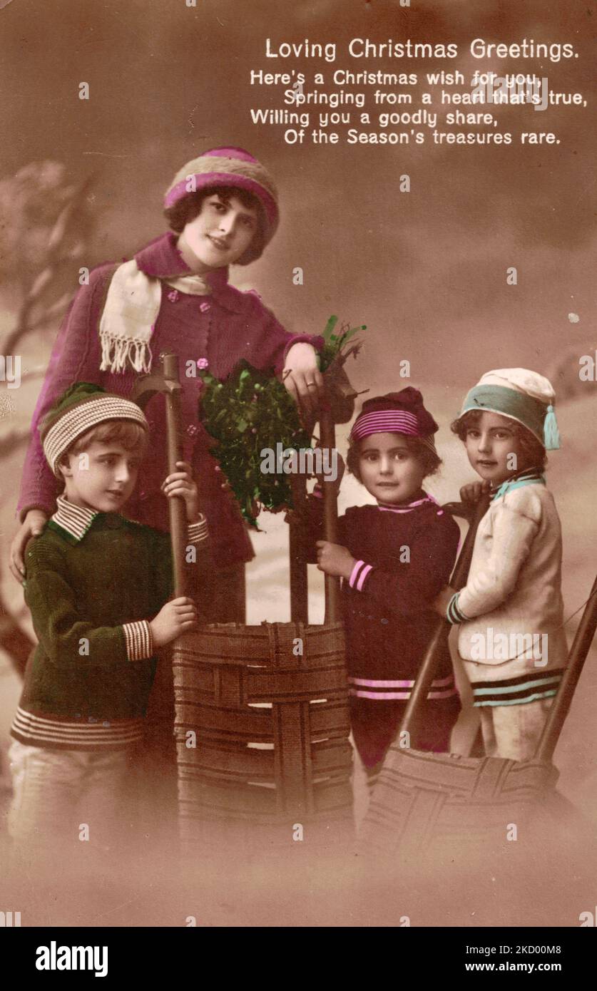 Loving Christmas Greetings Postcard, circa 1910 Stock Photo