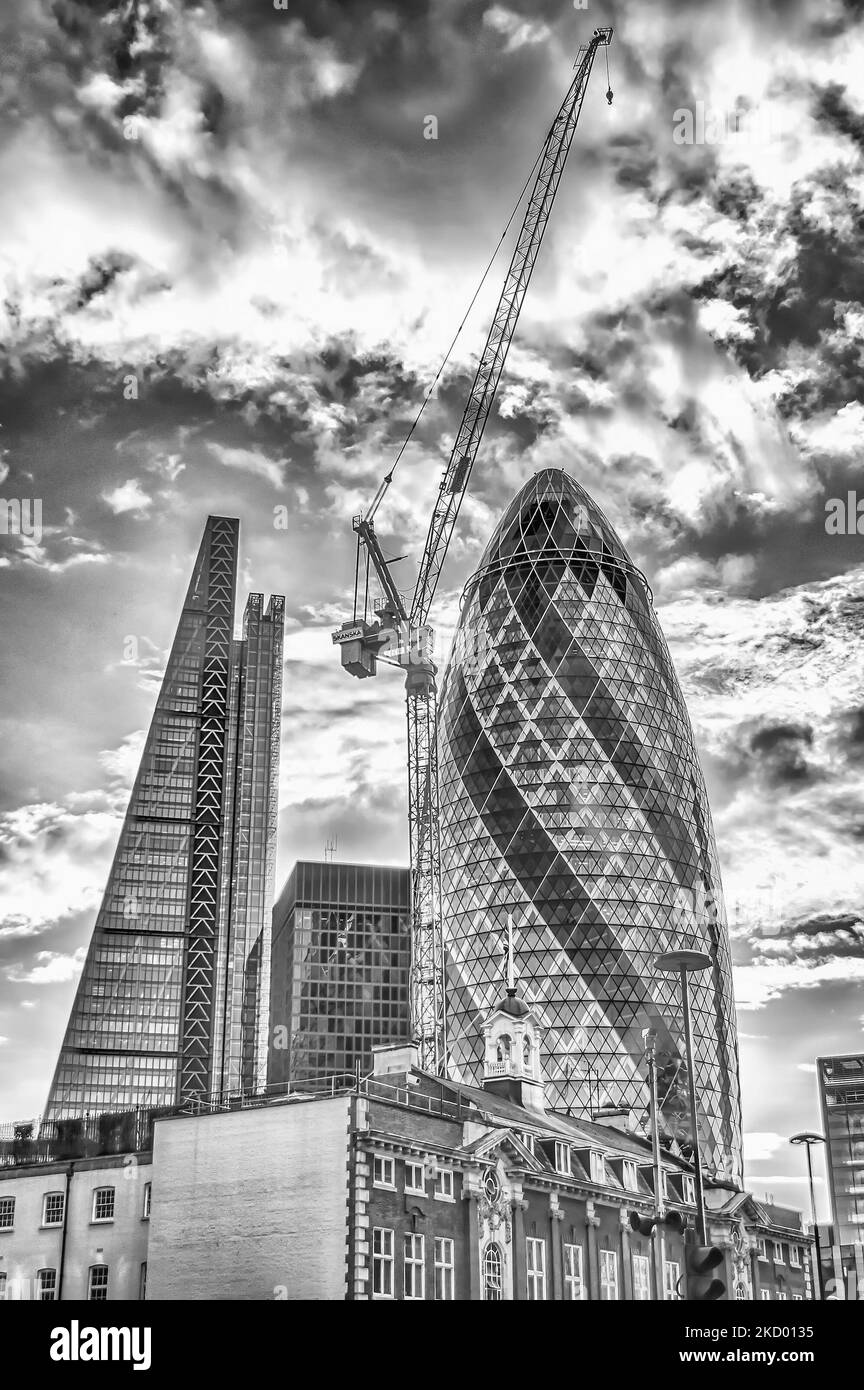 LONDON - MAY 29: The Gherkin building (30 St Mary Axe) in London on May 29, 2015. Iconic landmark of London, this is one of the city's most widely rec Stock Photo