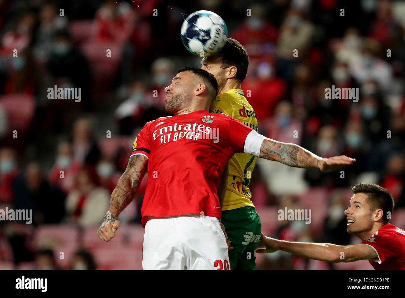 Otamendi of SL Benfica(L) vies with Marco Baixinho of FC Pacos Ferreira during the Portuguese League football match between SL Benfica and FC Pacos Ferreira at the Luz stadium in Lisbon, Portugal on January 9, 2022. (Photo by Pedro FiÃºza/NurPhoto) Stock Photo