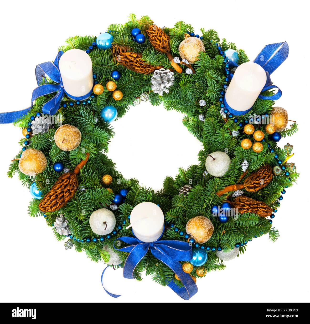 Christmas wreath isolated on white background, top view of New Year composition with candles and ornaments. Christmas decoration made of natural green Stock Photo