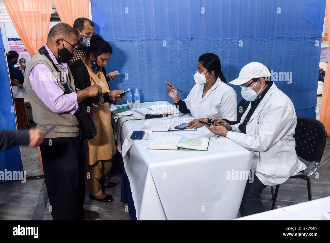 Senior citizens registering their name to get a booster dose of COVID-19 vaccine, citizen in Guwahati, Assam, India on Monday, Jan. 10, 2022. Vaccination drive for the third dose or ‘precautionary dose to priority groups — health care workers, frontline workers and those aged above 60 years with comorbidities began on Monday. (Photo by David Talukdar/NurPhoto) Stock Photo