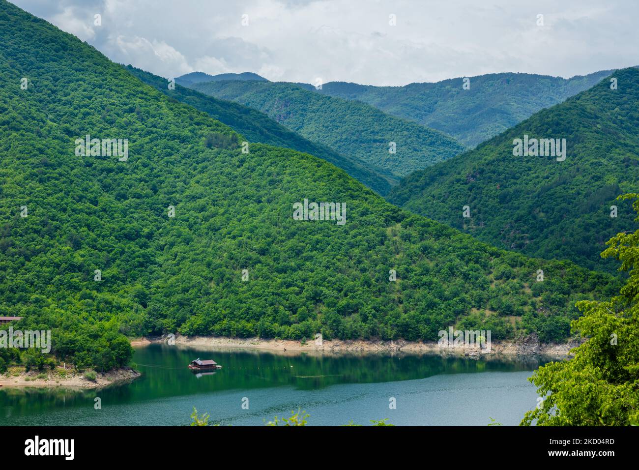aerial view of green mountains, clouds and river Stock Photo - Alamy