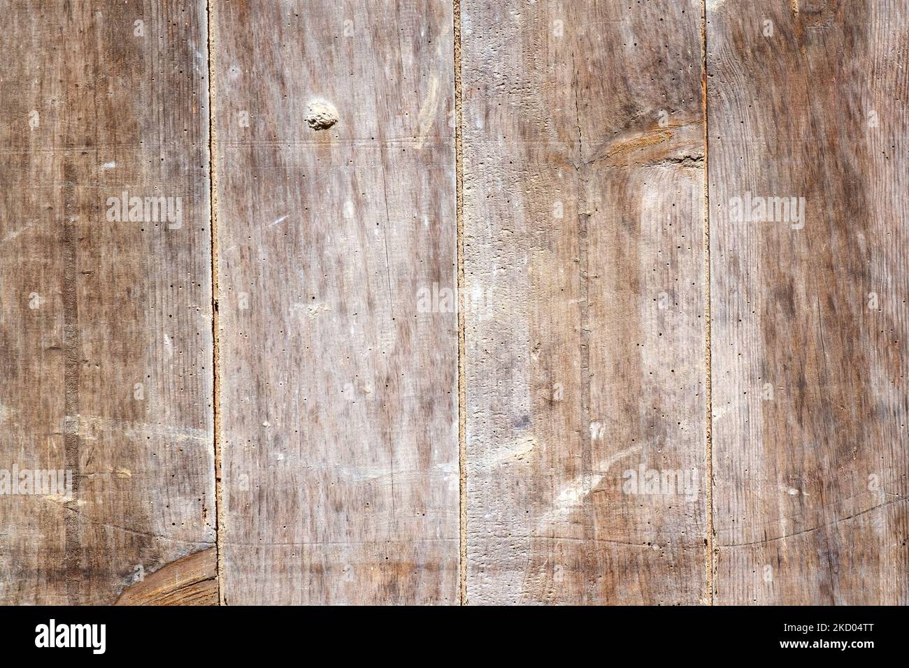 Old wooden exterior door full frame background texture Stock Photo